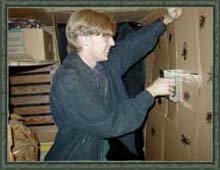 I staple up the Bug Tunnel walls